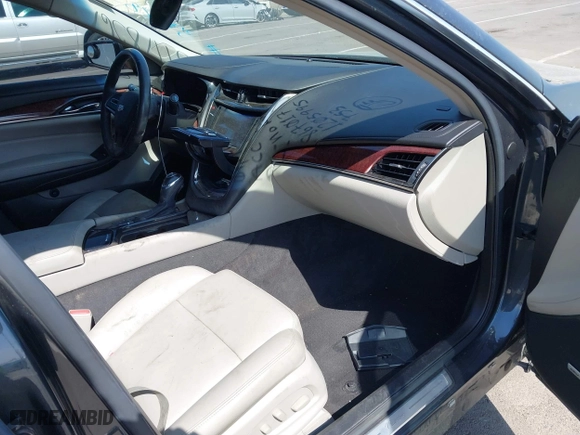 2016 Cadillac CTS Sedan RWD with VIN 1G6AP5SX8G0106667, listed as a IAAI auction lot 39978567 with 96,773 mi miles. Bid and sale history available at carsss.com. Image 5.