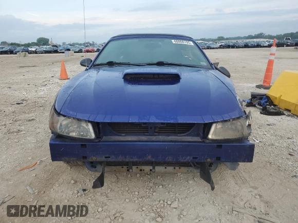 2004 Ford Mustang Deluxe with VIN 1FAFP444X4F107575, listed as a Copart auction lot 60908705 with 148,467 mi miles and Salvage title. Bid and sale history available at DreamBid. Image 5.