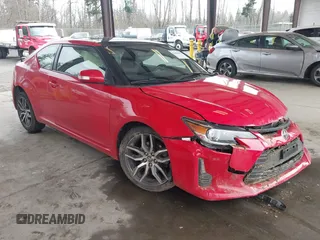 2015 Scion tC z VIN JTKJF5C71FJ008872, wystawiony jako IAAI lot #41664672 z przebiegiem 119 142 mil mil oraz . Historia ofert i sprzedaży dostępna na DreamBid. Obrazek 1.