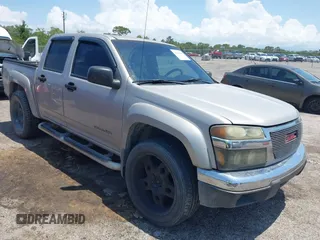2005 GMC Canyon 1SF SLE Z71 z VIN 1GTDT136958143066, wystawiony jako IAAI lot #42191864 z przebiegiem 192 584 mil mil oraz . Historia ofert i sprzedaży dostępna na DreamBid. Obrazek 1.