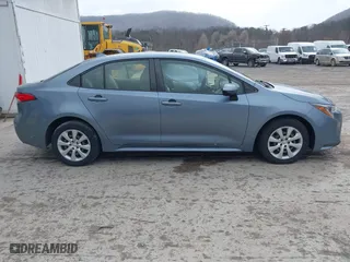 2020 Toyota Corolla LE with VIN JTDEPRAEXLJ001297, listed as a IAAI auction lot 41880882 with 76,407 mi miles. Bid and sale history available at carsss.com. Image 13.