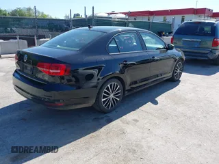 2015 Volkswagen Jetta SE z VIN 3VWD17AJ0FM348432, wystawiony jako IAAI lot #42124810 z przebiegiem 129 034 mil mil oraz . Historia ofert i sprzedaży dostępna na DreamBid. Obrazek 4.
