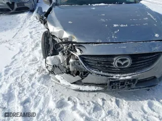 2014 Mazda Mazda6 i Sport with VIN JM1GJ1U57E1110634, listed as a IAAI auction lot 41414096 with NaN miles. Bid and sale history available at carsss.com. Image 6.