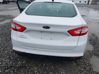 2013 Ford Fusion S with VIN 3FA6P0G76DR211501, listed as a IAAI auction lot 42095275 with 205,716 mi miles. Bid and sale history available at carsss.com. Image 6.