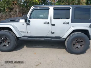 2008 Jeep Wrangler Unlimited Sahara with VIN 1J4GA59158L623784, listed as a IAAI auction lot 40365783 with 185,224 mi miles and . Bid and sale history available at DreamBid. Image 14.