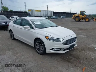 2017 Ford Fusion Titanium with VIN 3FA6P0K96HR115561, listed as a IAAI auction lot 42596030 with 187,865 mi miles and . Bid and sale history available at DreamBid. Image 1.