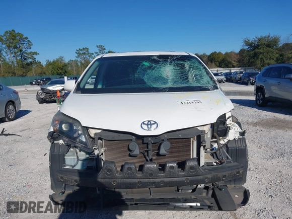 2014 Toyota Sienna SE with VIN 5TDXK3DC4ES487772, listed as a IAAI auction lot 41218295 with 153,368 mi miles and . Bid and sale history available at DreamBid. Image 12.