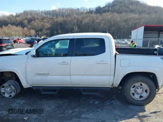 2023 Toyota Tacoma 4WD SR with VIN 3TMCZ5AN1PM538367, listed as a IAAI auction lot 41468684 with 28,879 mi miles. Bid and sale history available at carsss.com. Image 14.