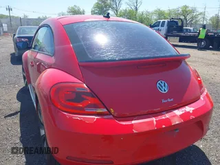 2012 Volkswagen Beetle 2.0T Turbo w/Sun/Snd/Nav PZEV with VIN 3VWVA7AT4CM608798, listed as a IAAI auction lot 42130353 with 152,052 mi miles. Bid and sale history available at carsss.com. Image 6.