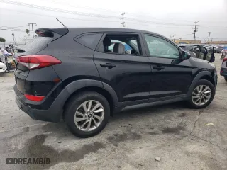 2018 Hyundai Tucson SE with VIN KM8J23A45JU698516, listed as a Copart auction lot 49079215 with 57,609 mi miles and Salvage Title. Bid and sale history available at carsss.com. Image 3.