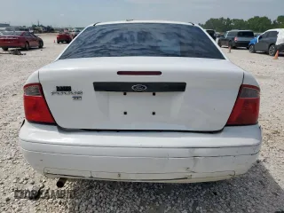 2007 Ford Focus S with VIN 1FAHP34NX7W225626, listed as a Copart auction lot 58202395 with 157,844 mi miles and Salvage title. Bid and sale history available at DreamBid. Image 6.