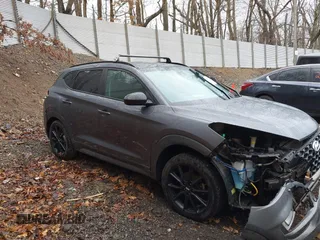 2019 Hyundai Tucson Ultimate with VIN KM8J3CAL0KU020133, listed as a IAAI auction lot 41856333 with 93,772 mi miles. Bid and sale history available at carsss.com. Image 14.