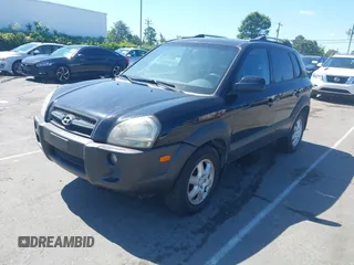 2005 Hyundai Tucson GLS with VIN KM8JN72D95U193338, listed as a IAAI auction lot 42205240 with 172,424 mi miles. Bid and sale history available at carsss.com. Image 2.