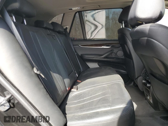 2016 BMW X5 xDrive40e z VIN 5UXKT0C59G0S77407, wystawiony jako Copart lot #50094255 z przebiegiem 93 264 mil mil oraz Szkoda całkowita • Salvage title. Historia ofert i sprzedaży dostępna na DreamBid. Obrazek 11.
