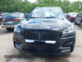 2020 Lincoln Aviator Grand Touring with VIN 5LMYJ8XY2LGL35999, listed as a IAAI auction lot 42344715 with 54,449 mi miles and . Bid and sale history available at DreamBid. Image 12.
