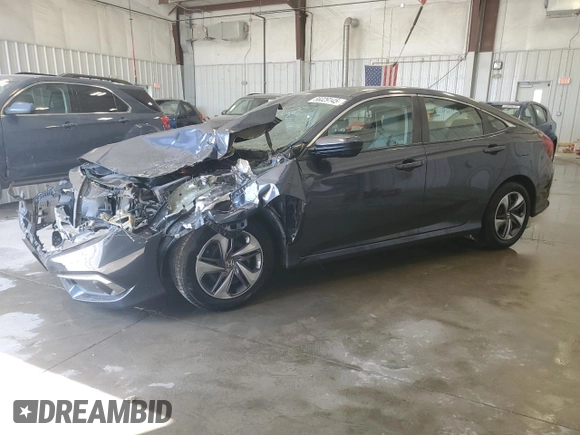 2021 Honda Civic LX z VIN 2HGFC2F60MH502941, wystawiony jako Copart lot #56029145 z przebiegiem 52 290 mil mil oraz Nie do naprawy • Non repairable. Historia ofert i sprzedaży dostępna na DreamBid. Obrazek 1.