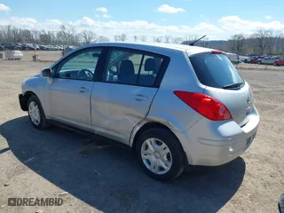 2012 Nissan Versa S with VIN 3N1BC1CP1CK269395, listed as a IAAI auction lot 42049078 with 129,091 mi miles. Bid and sale history available at carsss.com. Image 3.