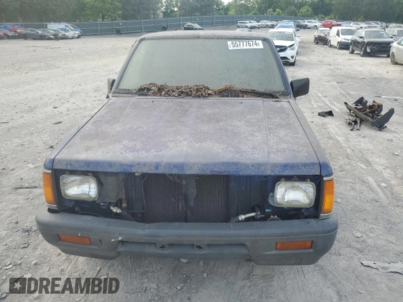1995 Mitsubishi Mighty Max z VIN JA7LS21G4SP002839, wystawiony jako Copart lot #55777674 z przebiegiem Nie podano mil oraz Czysty tytuł • Clean title. Historia ofert i sprzedaży dostępna na DreamBid. Obrazek 5.