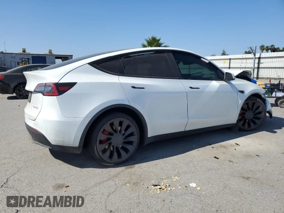 2022 Tesla Model Y Performance with VIN 7SAYGDEF9NF392197, listed as a Copart auction lot 57259105 with 43,400 mi miles and Salvage title. Bid and sale history available at DreamBid. Image 3.