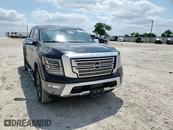 2023 Nissan Titan Platinum Reserve with VIN 1N6AA1EDXPN106467, listed as a Copart auction lot 53455215 with 56,061 mi miles and Salvage title. Bid and sale history available at DreamBid. Image 10.