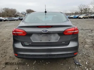 2018 Ford Focus SE with VIN 1FADP3F29JL206477, listed as a Copart auction lot 50410345 with 70,955 mi miles and Salvage Title. Bid and sale history available at DreamBid. Image 6.