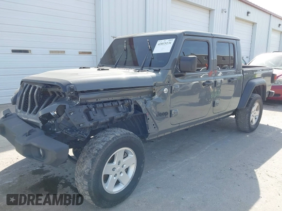 2020 Jeep Gladiator Sport S z VIN 1C6HJTAG7LL154664, wystawiony jako IAAI lot #42033131 z przebiegiem 73 282 mil mil oraz . Historia ofert i sprzedaży dostępna na DreamBid. Obrazek 18.