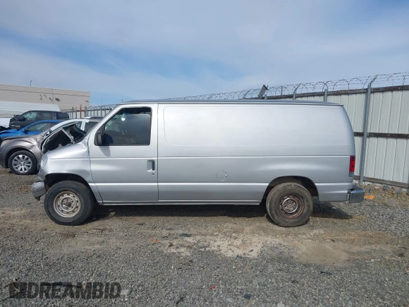 1998 Ford Econoline Cargo with VIN 1FTRE1428WHB30628, listed as a IAAI auction lot 41706164 with 153,223 mi miles. Bid and sale history available at carsss.com. Image 14.