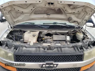2005 Chevrolet Express Passenger with VIN 1GAHG39U051232615, listed as a Copart auction lot 73574264 with 207,303 mi miles and Salvage title. Bid and sale history available at DreamBid. Image 12.