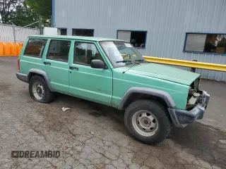 1999 Jeep Cherokee SE with VIN 1J4FF28SXXL641556, listed as a Copart auction lot 62605065 with Not provided miles and Salvage title. Bid and sale history available at DreamBid. Image 4.