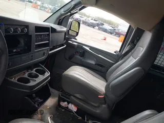2012 Chevrolet Express Cargo Van with VIN 1GCSGAFX1C1202181, listed as a IAAI auction lot 42050001 with 167,854 mi miles. Bid and sale history available at carsss.com. Image 5.