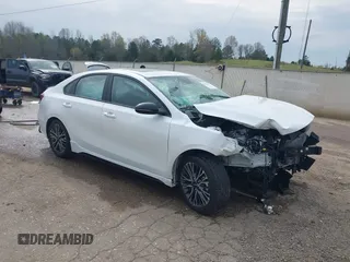 2023 Kia Forte GT-Line z VIN 3KPF54AD7PE683899, wystawiony jako IAAI lot #41902601 z przebiegiem 13 859 mil mil oraz . Historia ofert i sprzedaży dostępna na DreamBid. Obrazek 1.