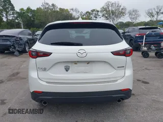 2023 Mazda CX-5 2.5 S Premium Package with VIN JM3KFBDM1P0126787, listed as a IAAI auction lot 41164586 with 12,076 mi miles. Bid and sale history available at carsss.com. Image 16.