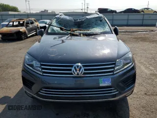2015 Volkswagen Touareg Lux с VIN WVGEP9BP6FD003059, выставлен на аукционе Copart как лот 59670505 с пробегом 162 945 миль миль и Списание • Salvage title. История ставок и продаж доступна на DreamBid. Изображение 5.