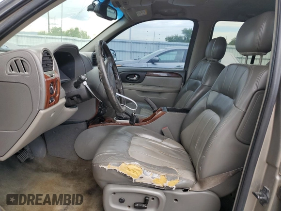 2003 GMC Envoy SLT with VIN 1GKDT13SX32281667, listed as a Copart auction lot 66211344 with 228,312 mi miles and Clean Title. Bid and sale history available at carsss.com. Image 7.