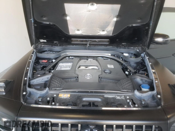 2022 Mercedes-Benz G 63 AMG with VIN W1NYC7HJ2NX444083, listed as a Copart auction lot 64764324 with 7,909 mi miles and Salvage title. Bid and sale history available at DreamBid. Image 12.