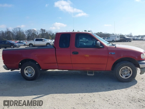 2000 Ford F-150 XL with VIN 1FTZX1729YNC32076, listed as a IAAI auction lot 41523364 with 216,726 mi miles. Bid and sale history available at carsss.com. Image 13.