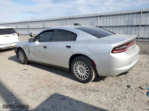2019 Dodge Charger Police with VIN 2C3CDXKT0KH700797, listed as a Copart auction lot 79657154 with 156,267 mi miles and Salvage Title. Bid and sale history available at carsss.com. Image 2.