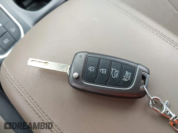 2019 Hyundai Santa Fe SE z VIN 5NMS2CADXKH005960, wystawiony jako IAAI lot #42341142 z przebiegiem 71 617 mil mil oraz . Historia ofert i sprzedaży dostępna na DreamBid. Obrazek 11.