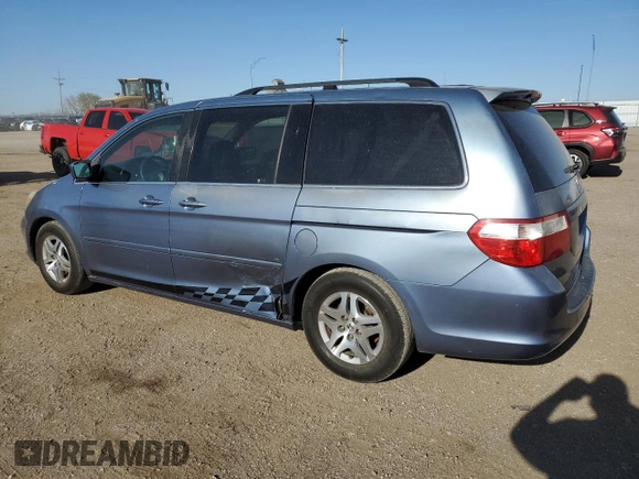 2005 Honda Odyssey EX-L with VIN 5FNRL38765B072878, listed as a Copart auction lot 54610815 with 271,460 mi miles and Salvage title. Bid and sale history available at DreamBid. Image 2.