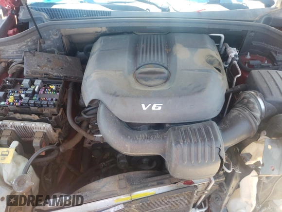 2014 Dodge Durango SXT z VIN 1C4RDJAG4EC980139, wystawiony jako Copart lot #57509035 z przebiegiem 152 865 mil mil oraz Szkoda całkowita • Salvage title. Historia ofert i sprzedaży dostępna na DreamBid. Obrazek 12.
