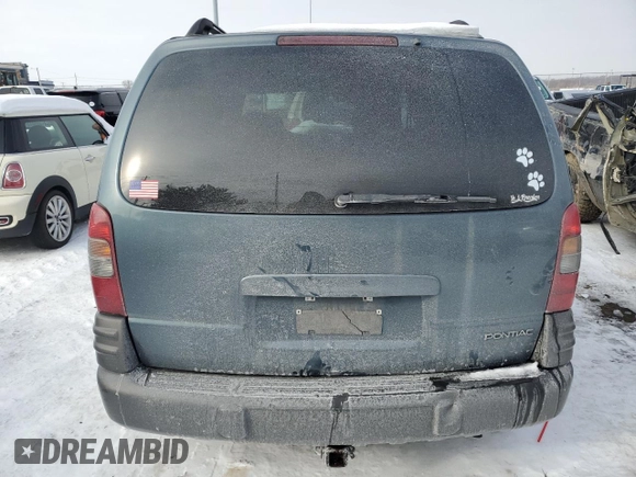 2004 Pontiac Montana z VIN 1GMDU03E04D139648, wystawiony jako Copart lot #41498175 z przebiegiem 243 739 mil mil oraz Szkoda całkowita • Salvage title. Historia ofert i sprzedaży dostępna na DreamBid. Obrazek 6.