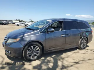 2015 Honda Odyssey Touring Elite with VIN 5FNRL5H9XFB105833, listed as a Copart auction lot 55226215 with 64,397 mi miles and Salvage title. Bid and sale history available at DreamBid. Image 1.