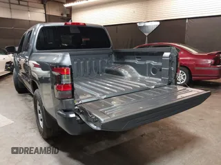2024 Nissan Frontier SV with VIN 1N6ED1EKXRN667858, listed as a IAAI auction lot 42377097 with 2,072 mi miles and . Bid and sale history available at DreamBid. Image 3.