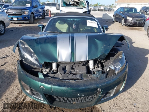 2008 Saturn Sky Red Line with VIN 1G8MF35X58Y118317, listed as a IAAI auction lot 41944739 with 106,223 mi miles. Bid and sale history available at carsss.com. Image 12.