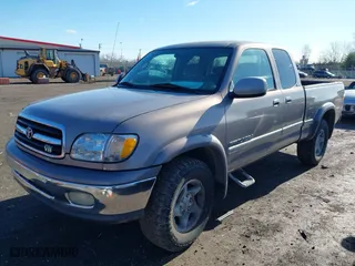 2001 Toyota Tundra Ltd with VIN 5TBBT481X1S128161, listed as a IAAI auction lot 41806069 with 214,825 mi miles. Bid and sale history available at carsss.com. Image 2.