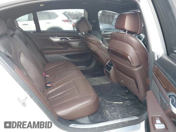 2018 BMW 7 Series 740i xDrive with VIN WBA7E4C59JGV23876, listed as a IAAI auction lot 41381398 with 106,675 mi miles. Bid and sale history available at carsss.com. Image 8.