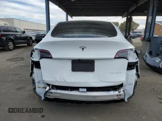 2022 Tesla Model Y Long Range with VIN 7SAYGDEE5NF435702, listed as a Copart auction lot 43754325 with 47,121 mi miles and Salvage Title. Bid and sale history available at carsss.com. Image 6.