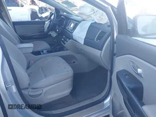 2016 Kia Sedona LX with VIN KNDMB5C18G6164472, listed as a IAAI auction lot 41661530 with 116,904 mi miles. Bid and sale history available at carsss.com. Image 5.