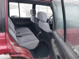 1996 Suzuki Sidekick z VIN JS3TD21V0T4107927, wystawiony jako IAAI lot #41249522 z przebiegiem 225 665 mil mil oraz . Historia ofert i sprzedaży dostępna na DreamBid. Obrazek 8.