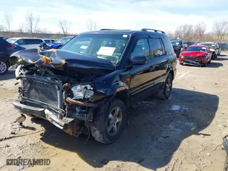 2007 Honda Pilot EX-L with VIN 5FNYF18787B029637, listed as a IAAI auction lot 41816373 with 305,036 mi miles. Bid and sale history available at carsss.com. Image 2.
